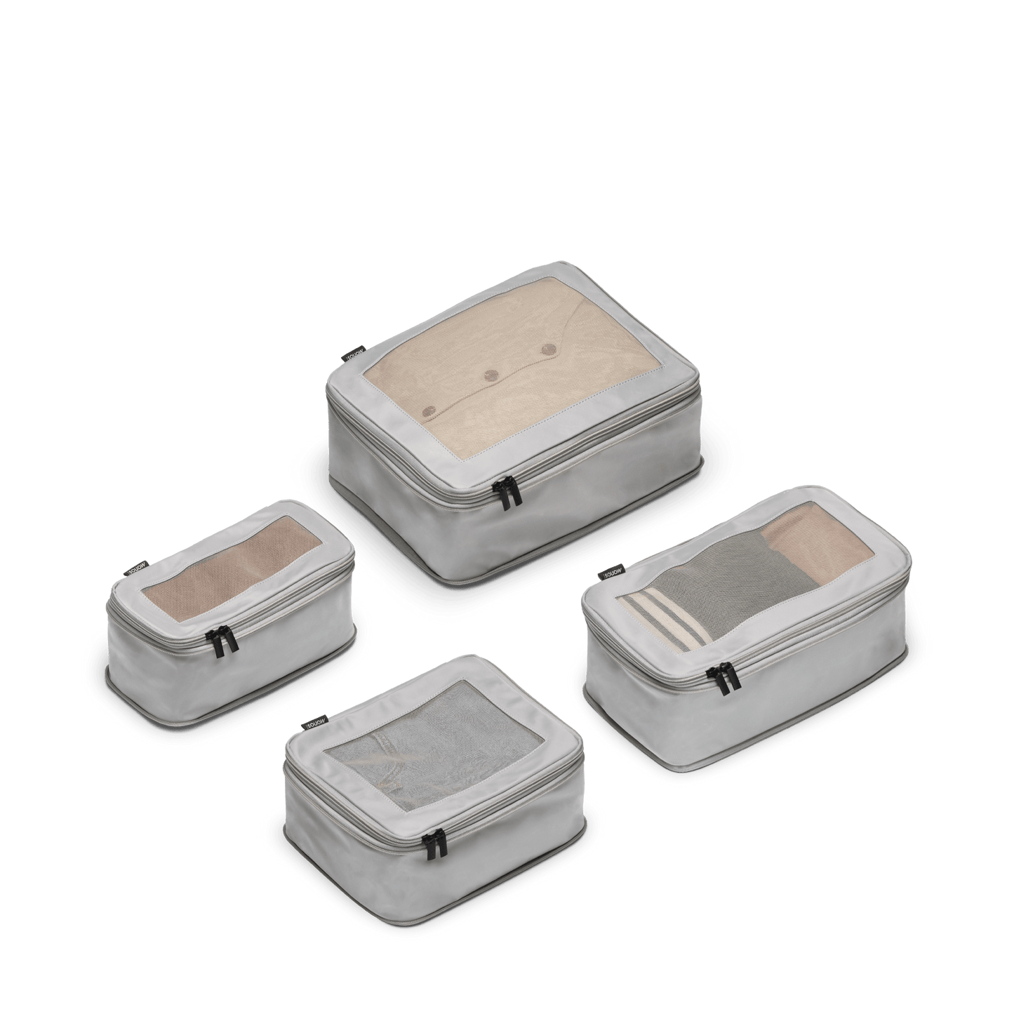 Set of Four / Grey Scaled | This is a photo of a set of four compressible packing cubes in grey