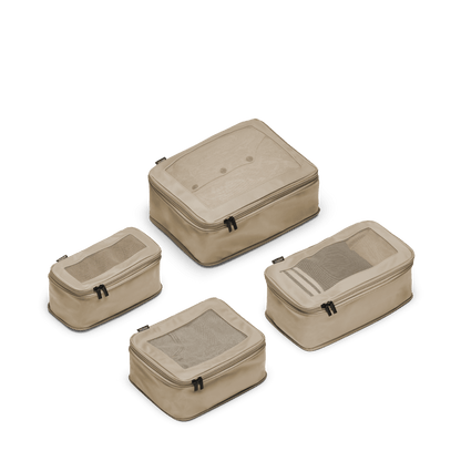 Set of Four / Tan Scaled | This is a photo of a set of four compressible packing cubes in tan