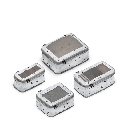 Set of Four / Terrazzo Light Grey Scaled | Set of four compressible packing cubes in Terrazzo Light Grey
