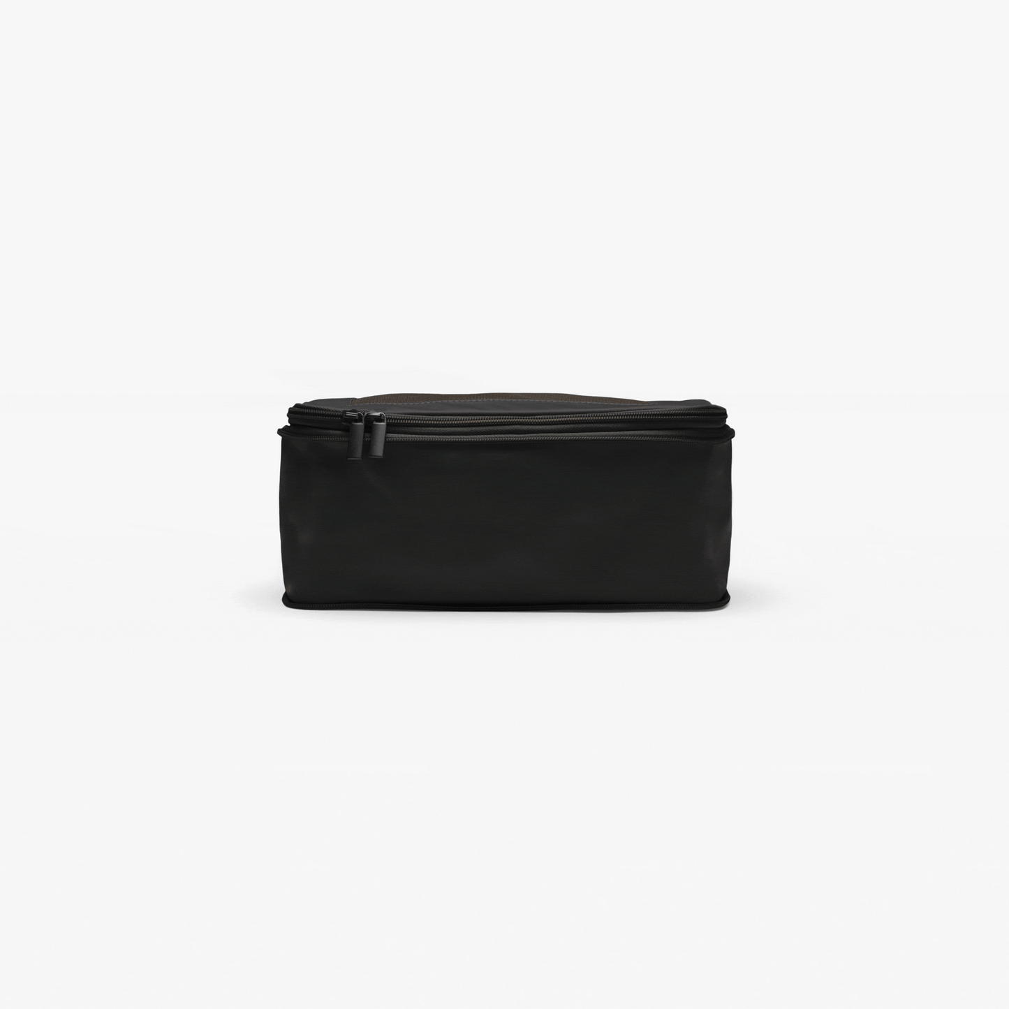 Black | This is a black compressible packing cube gif