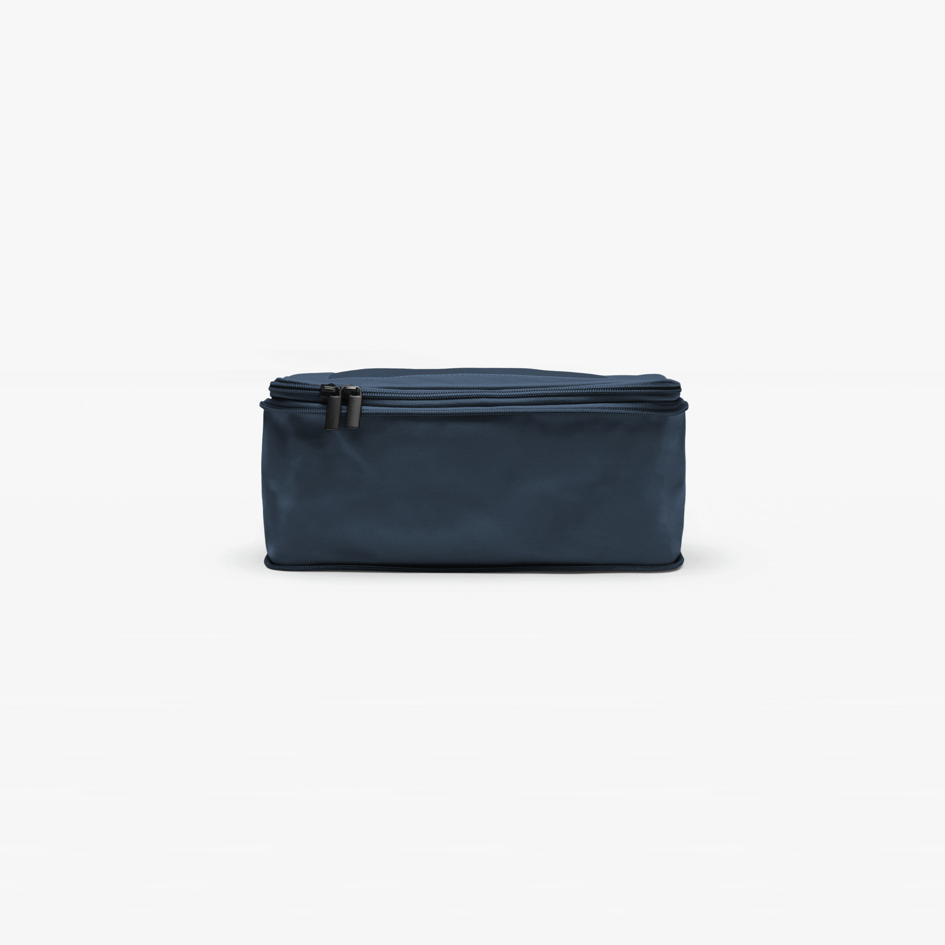 Set of Four / Arles Blue | This is an Arles Blue compressible packing cube gif