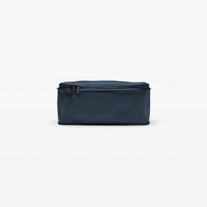 Set of Four / Arles Blue | This is an Arles Blue compressible packing cube gif