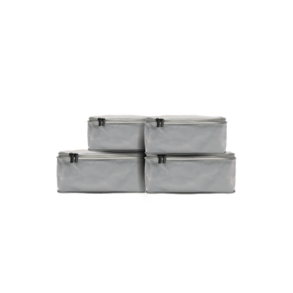 Set of Four / Grey Hidden | This is a photo of a set of four compressible packing cubes in grey